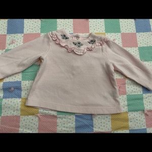 Pink and black sweater